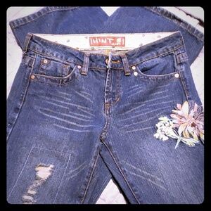 Hint embroidered distressed bootcut jeans